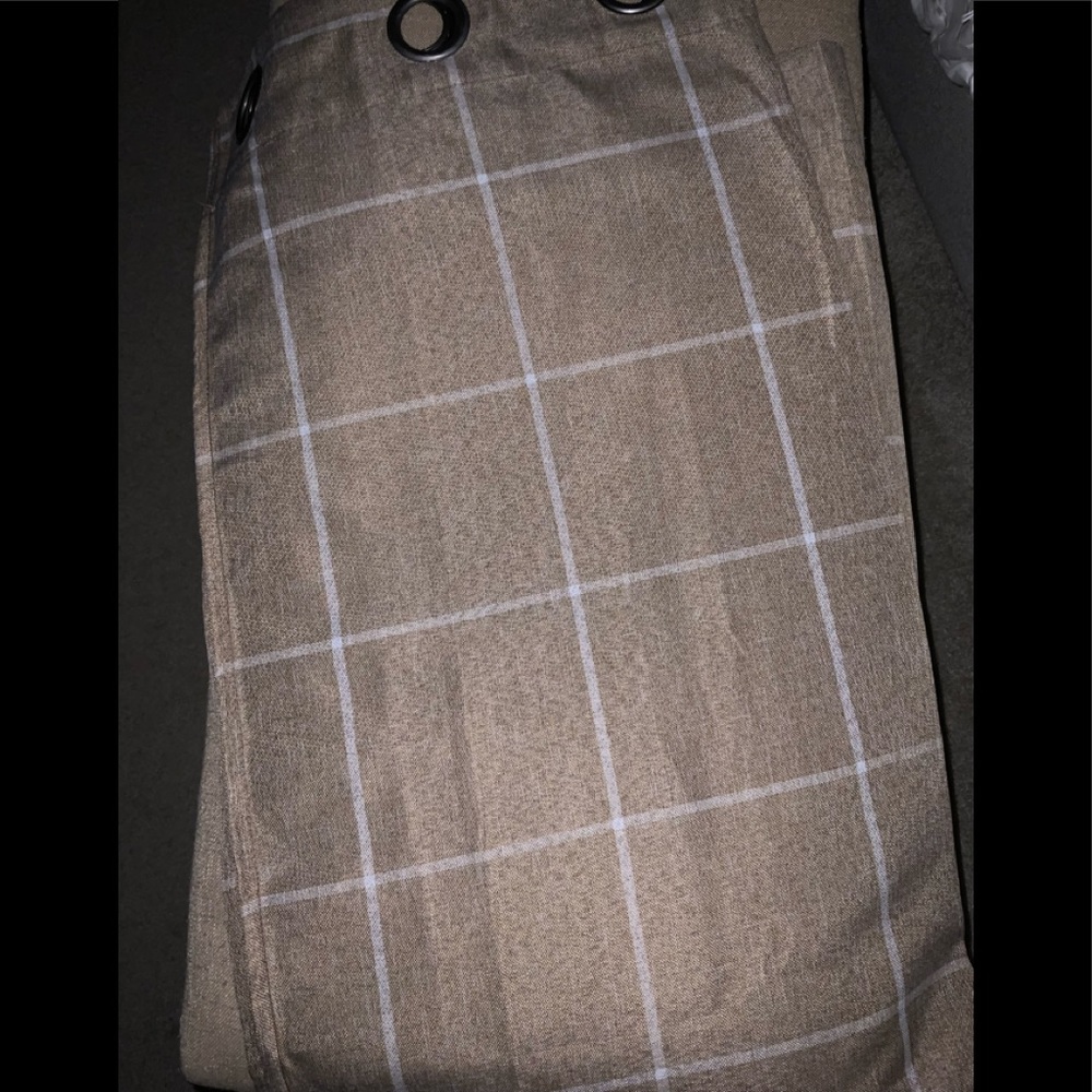 Pair of 63 in tan & white square patterned curtain